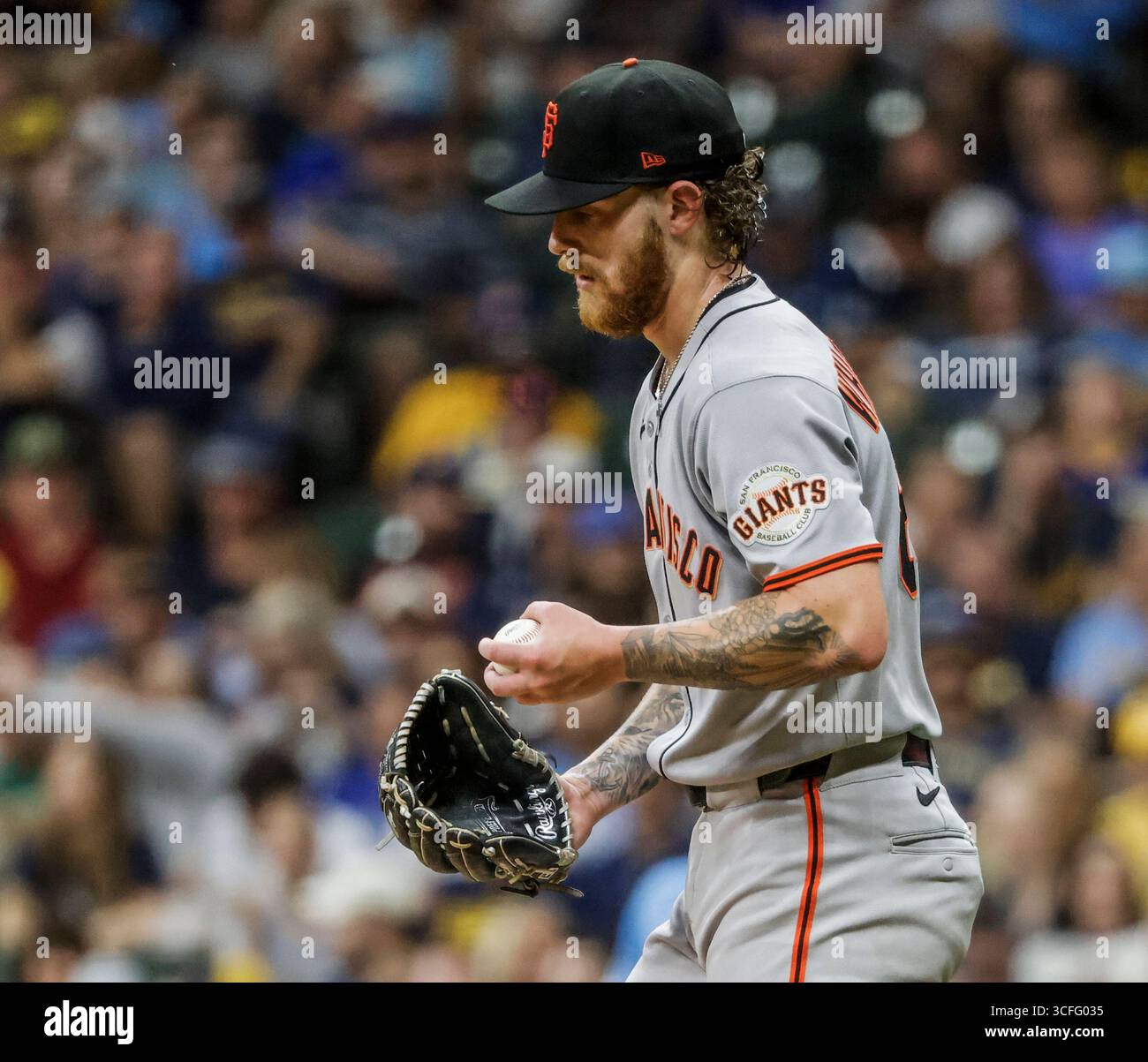 Milwaukee, United States. 22nd Aug, 2025. San Francisco Gants starting pitcher Carson Whisenhunt reacts after throwing a wild pitch in the fourth inning of the MLB game between the San Francisco Giants and the Milwaukee Brewers at American Family Filed in Milwaukee, Wisconsin on Friday, August 22, 2025. Photo by Tannen Maury/UPI Credit: UPI/Alamy Live News Stock Photo