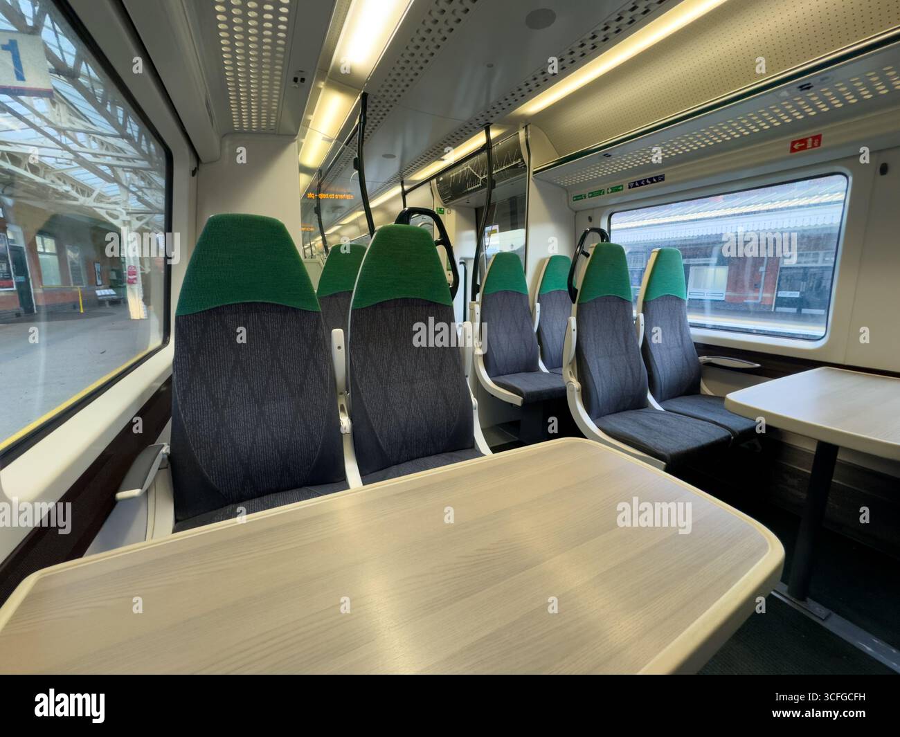 August 2025 Empty seats on a GWR Great Western Railway train carriage on an early morning weekend service at Newbury Train Station, Berkshire, UK Stock Photo
