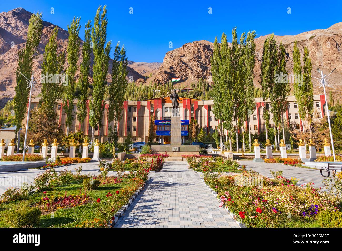 Khorog, Tajikistan - October 04, 2022: GBAO Gorno-Badakhshan Autonomous Region Government Building and Ismail Samoni statue in Khorog city, Tajikistan Stock Photo