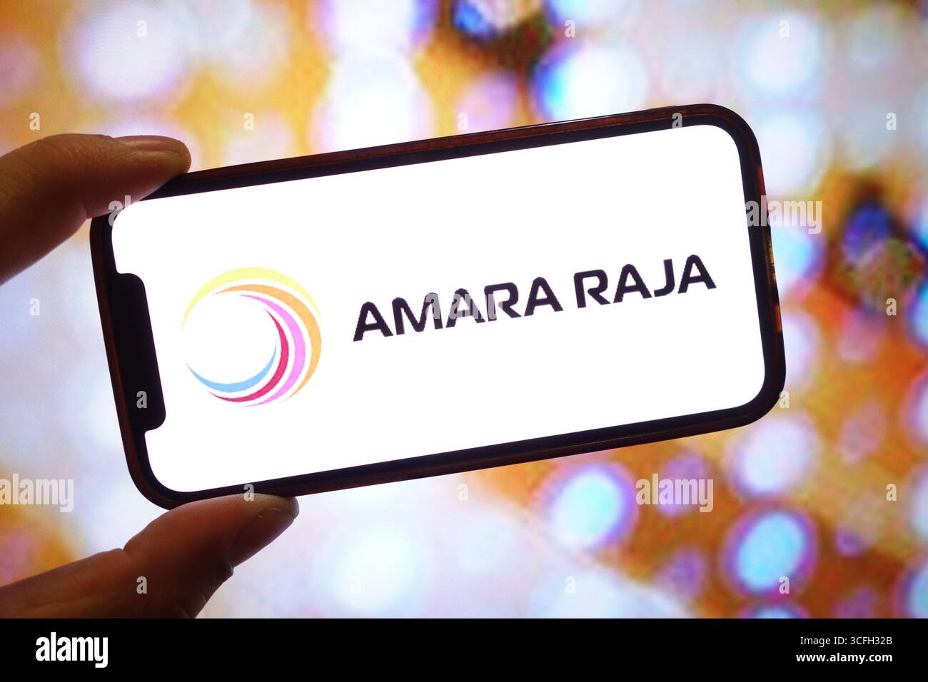 In this photo illustration, an Amara Raja Energy and Mobility company ...