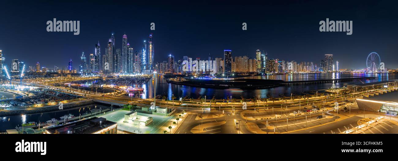 DUBAI. UNITED ARAB EMIRATES - JANUARY 26, 2025. Night view of Dubai Marina from Dubai Harbour Cruise Terminal Stock Photo