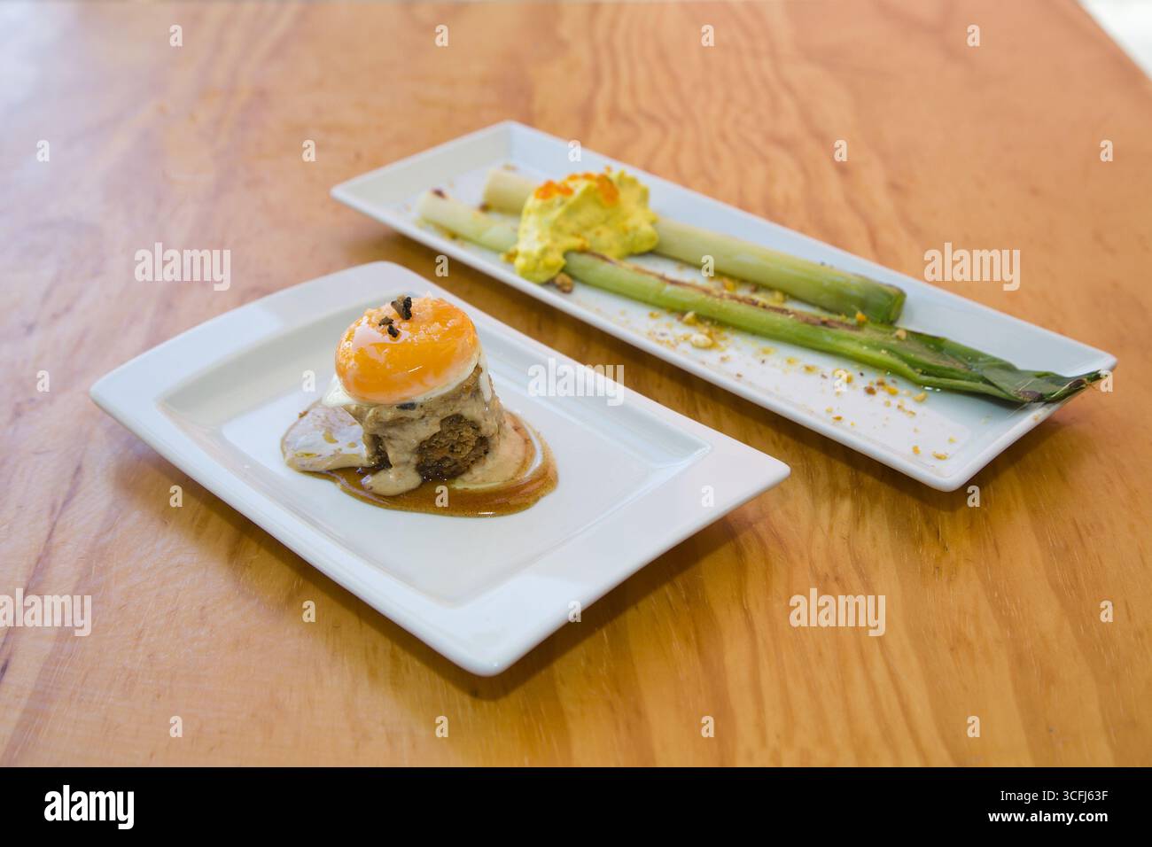 Leek with caviar, egg on cake with mushroom sauce, Tapas Bar Eslava, Sevilla, Andalusia, Spain Stock Photo