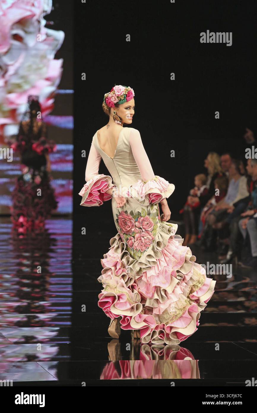 SIMOF Fair, fashion show for Trajes de Gitana, flamenco dresses, frilled  dresses, Seville, Andalusia, Spain Stock Photo - Alamy