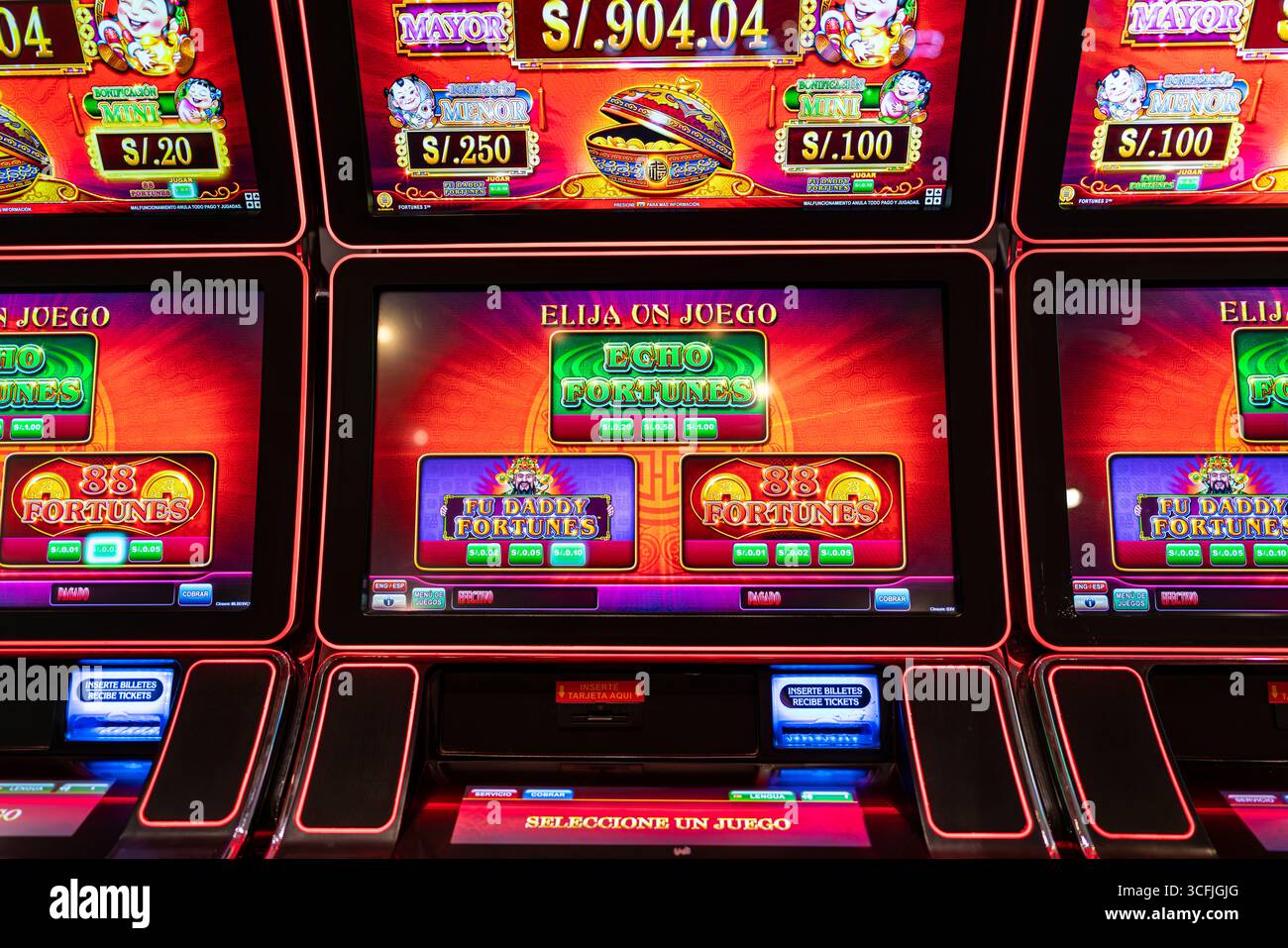 A Classic Gold Slot Machine Displaying Winning 777 Jackpot Combination