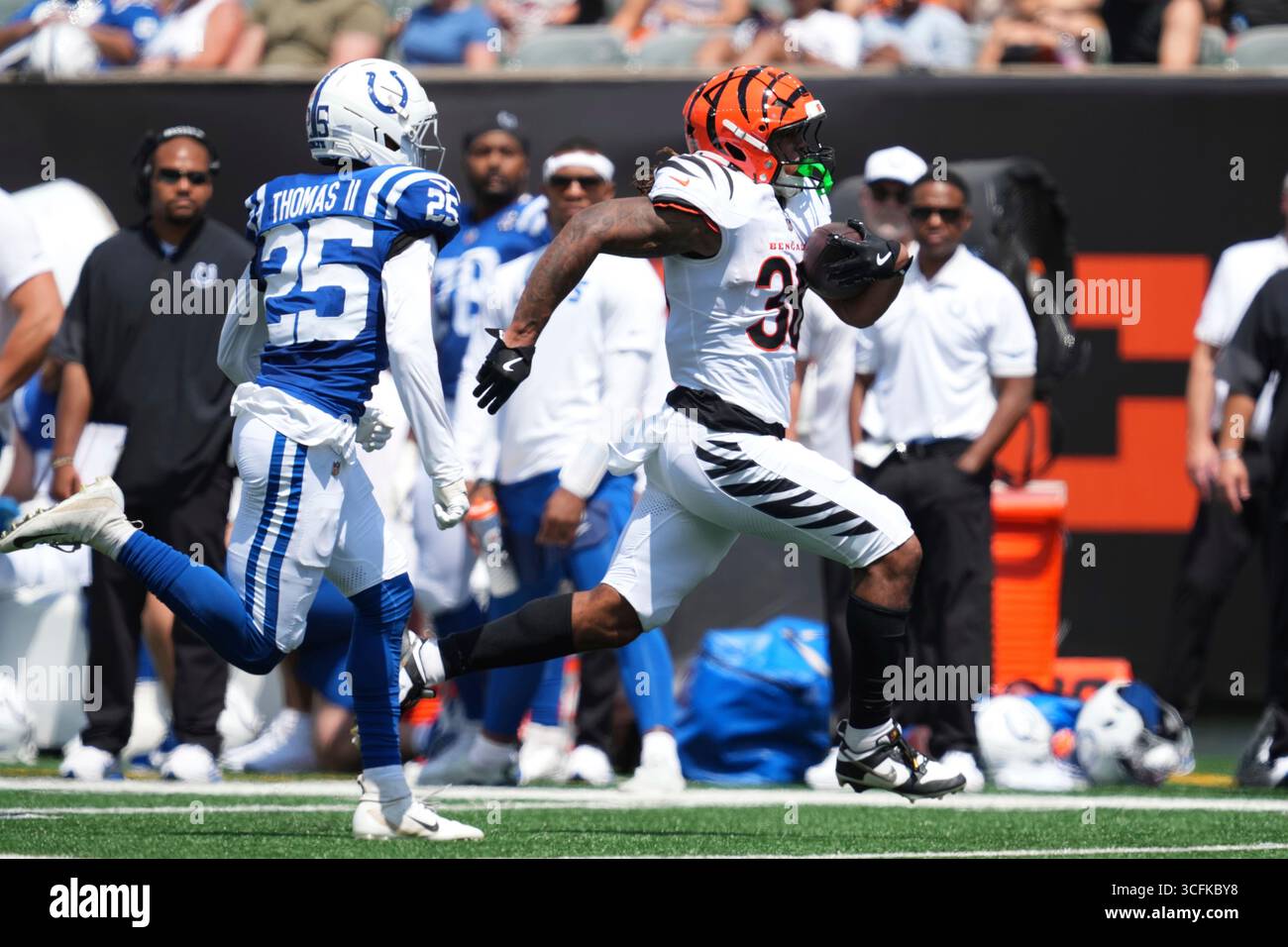 Cincinnati Bengals' Kendall Milton is chased by Indianapolis Colts ...