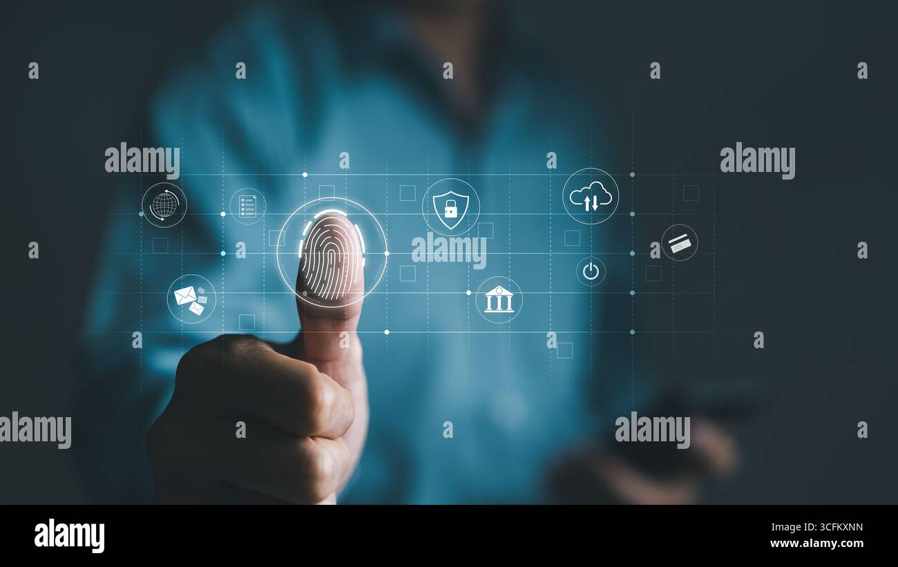 Cyber security concept. Businessman using thumb to scan fingerprint or for digital processing biometric identification to access security system Stock Photo