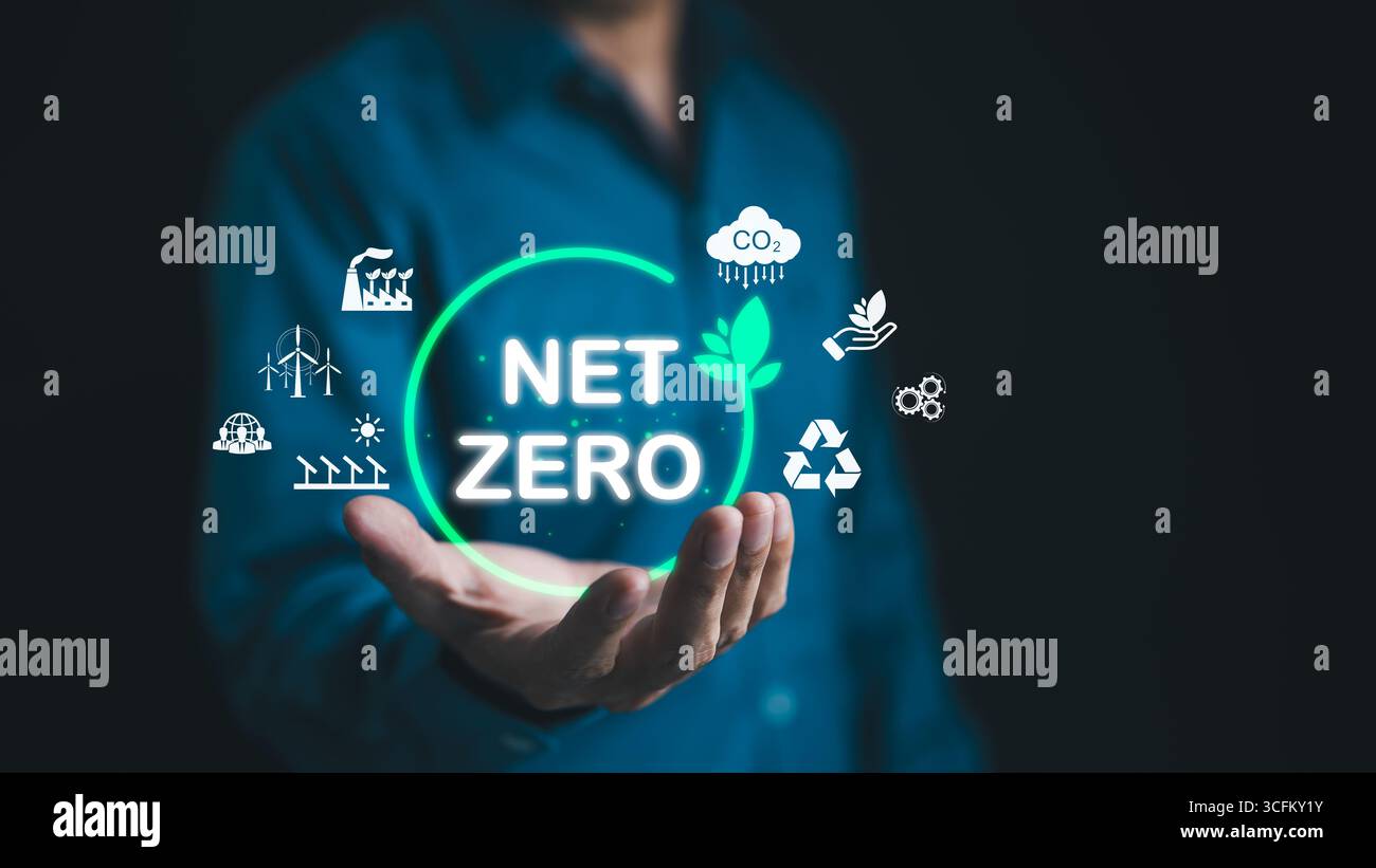 Net Zero emissions concept. Man holding to carbon reduction icons ...