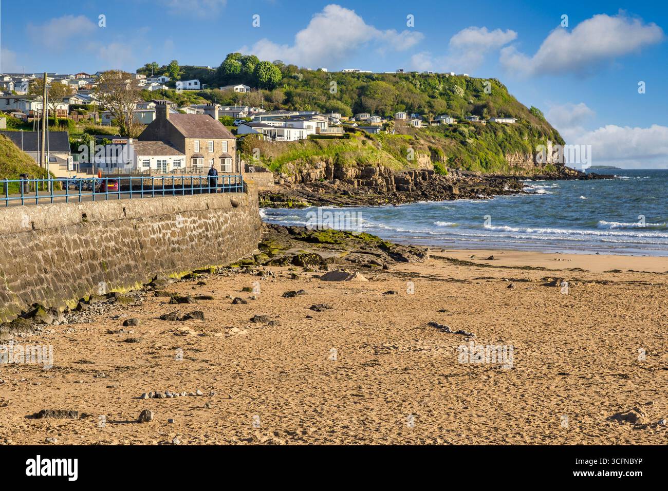 Benllech Beach and Village, a popular seaside resort and beach holiday destination., Anglesey, North Wales. Stock Photo