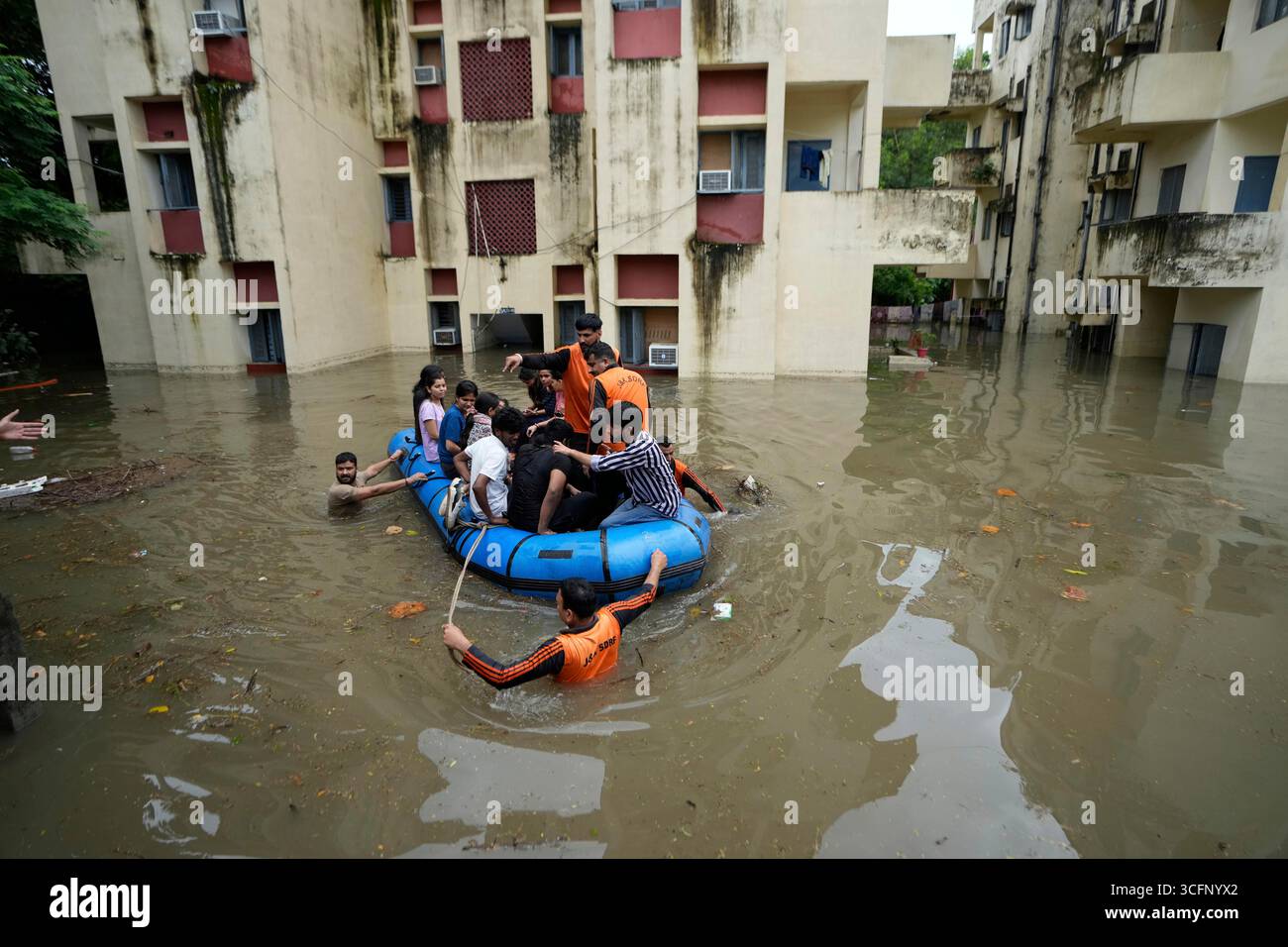 Disaster Stranded People Members of the State Disaster Response Force (SDRF) rescue students ...