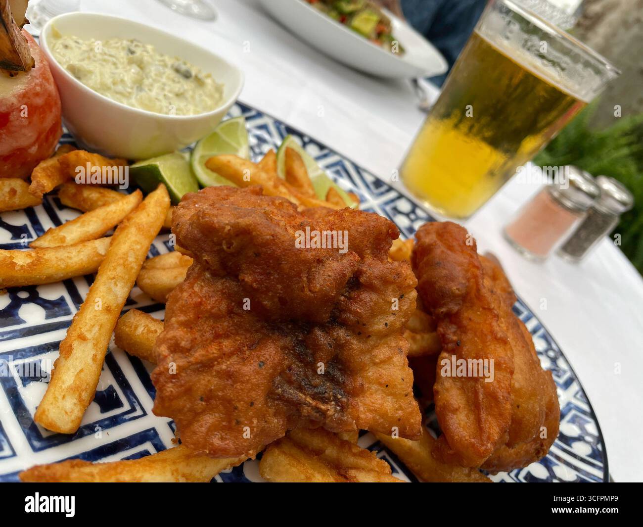 Close Up of Fish and Chips,  Outdoor Dining at the Bryant Park Grill Restaurant in  the summertime, Bryant Park, NYC, USA, 2025 - Smartphone Captured Stock Image