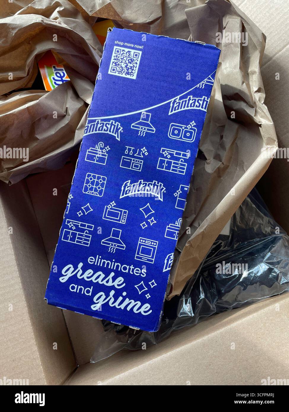 Amazon delivers the cleaning spray Fantastik in its separate box for safe shipping, 2025, United States - Smartphone Captured Stock Image