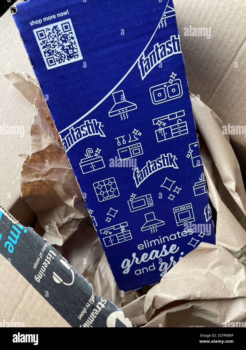 Amazon delivers the cleaning spray Fantastik in its separate box for safe shipping, 2025, United States - Smartphone Captured Stock Image