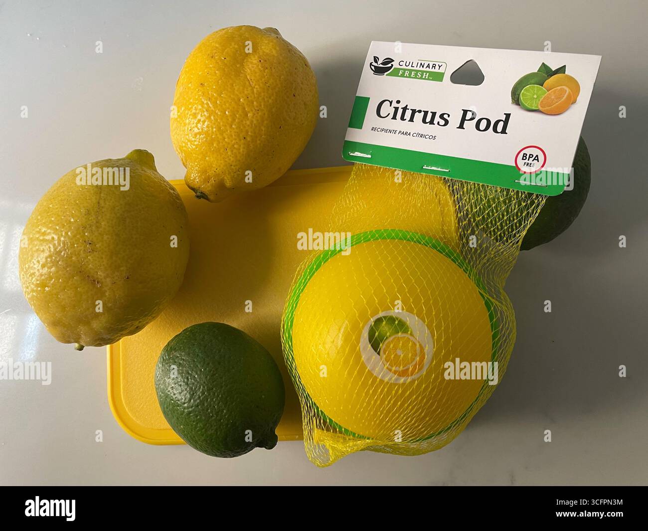 Culinary fresh sells a citrus pod for storing lemons and limes in a home kitchen, 2025, United States - Smartphone Captured Stock Image