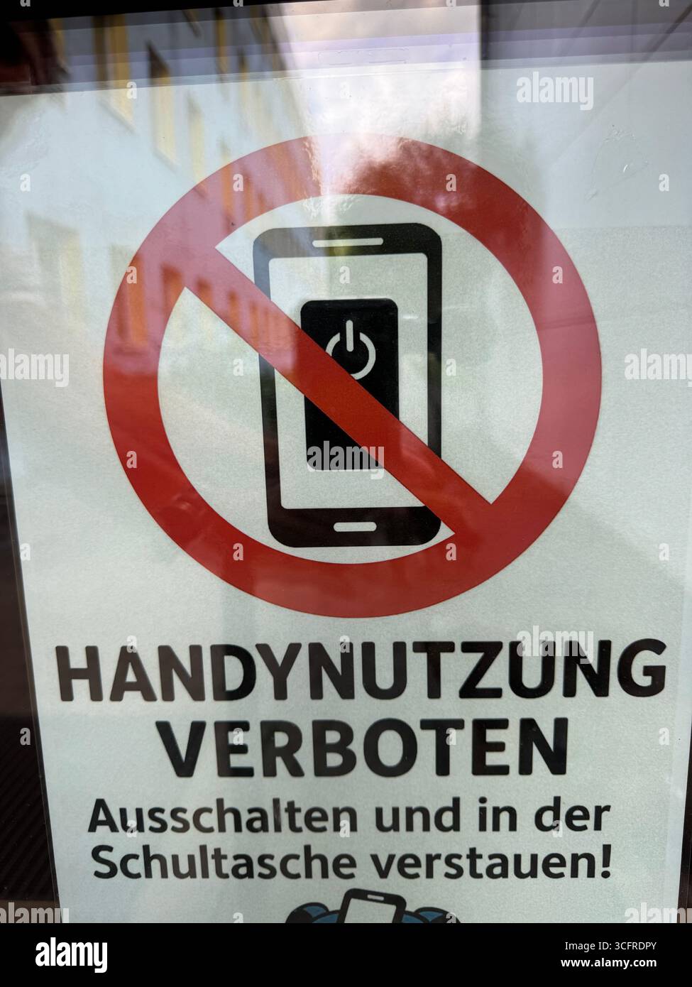 A Sign Prohibiting Phone Usage in Public Spaces to Encourage Calm and ...