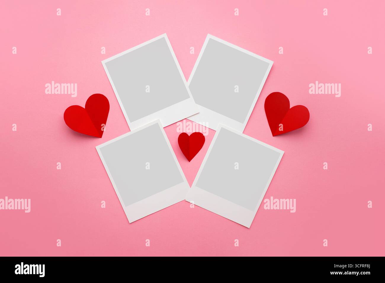 Collage of photo frames with paper hearts isolated on pink background. romantic photo frames. mockup Stock Photo