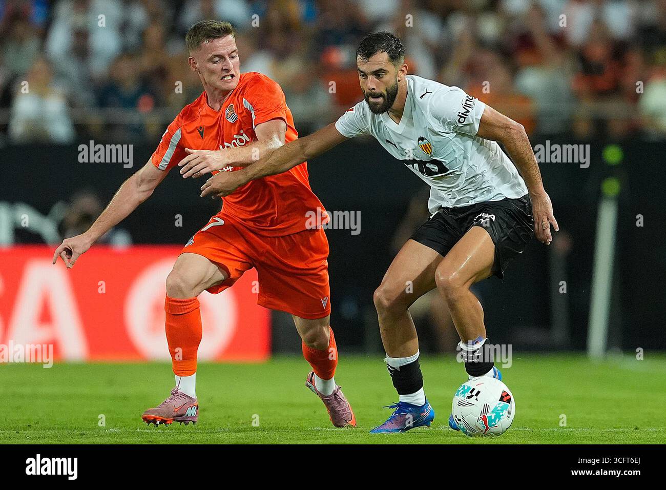 Valencia CF's Luis Rioja (r) and Real Sociedad's Sergio Gomez during La ...
