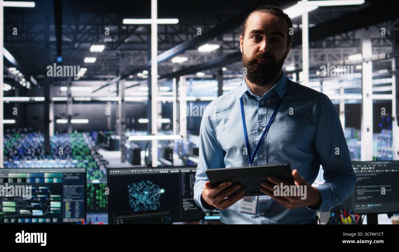 Data center lead programmer showcasing AI technology and rigs, filming ...
