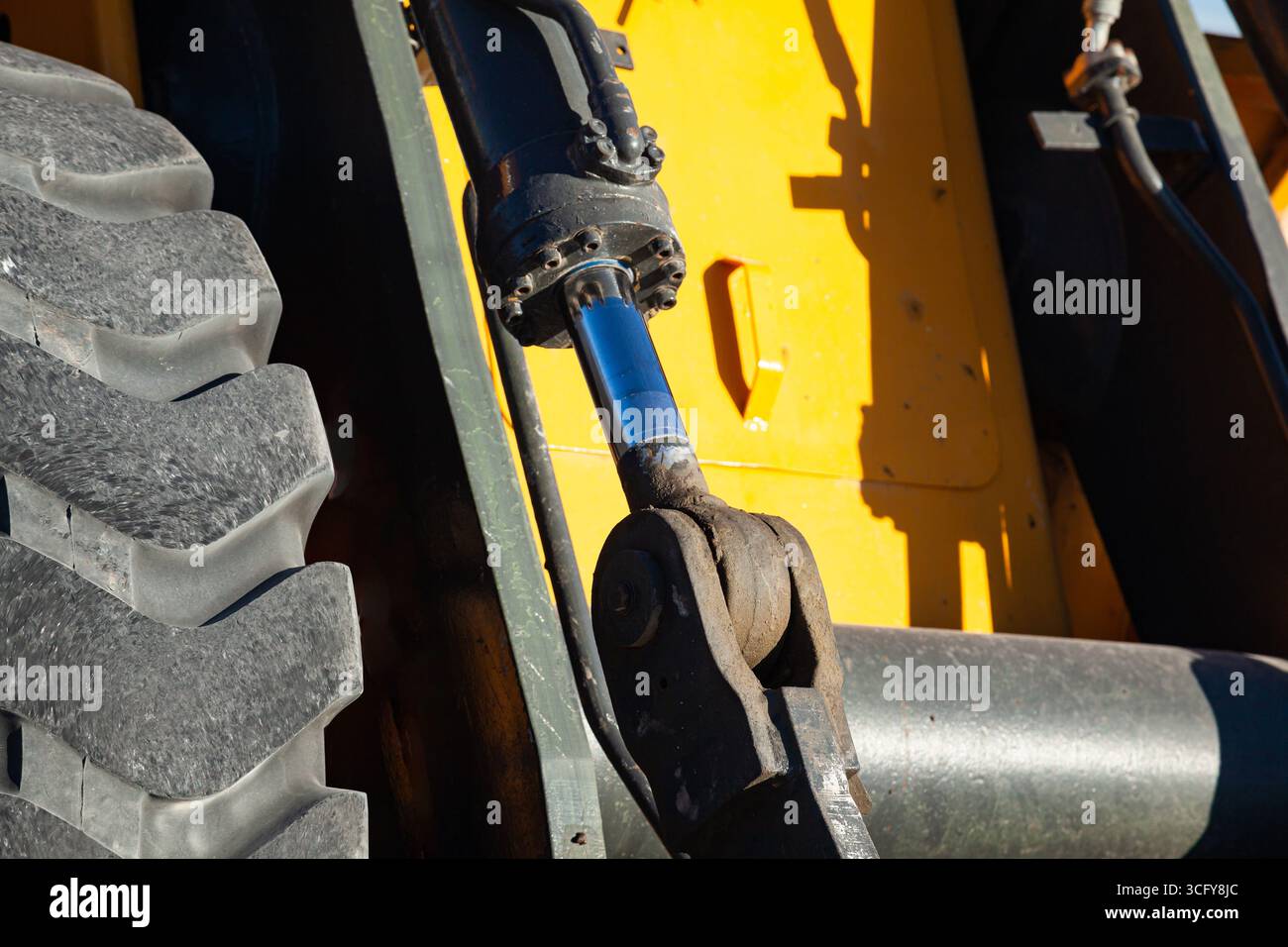 Frontal bulldozer loader. Yellow excavator close up. Stock Photo
