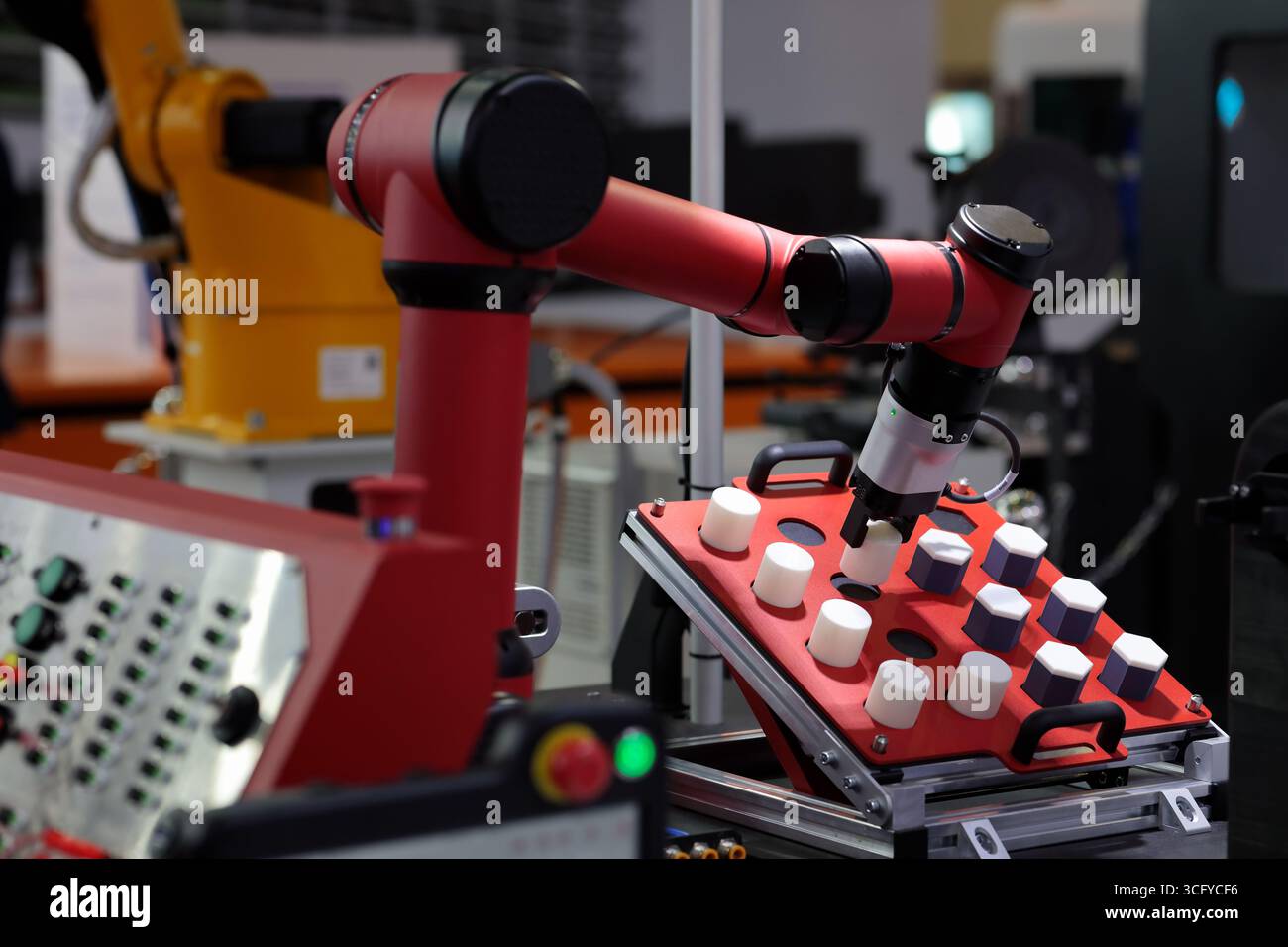 Robotic arm manipulators in robotics training center. Selective focus. Stock Photo