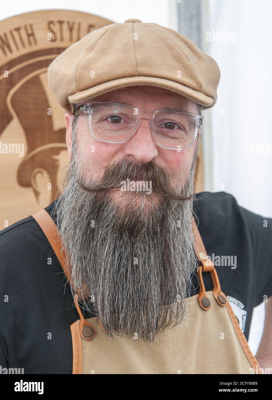 Exhibitor fellow at the Henley Country Craft Show, sporting a well groomed Beard. Stock Photo