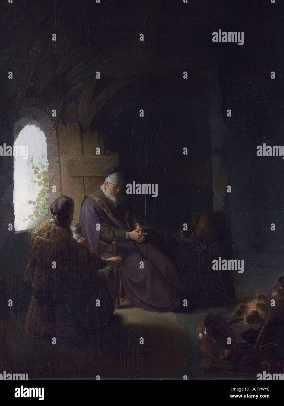 The story of Anna, her husband Tobit and their son Tobias is told in the God tested them by reducing them to poverty and causing Tobit's blindness. In the 17th century they were considered to be examples of piety in adversity. This painting was engraved as the work of Rembrandt during his lifetime, but it has subsequently been argued that its meticulous detail suggests that it was either a collaboration between Rembrandt and his Leiden pupil Gerrit Dou, or by Dou alone. Recent comparisons with the work of Rembrandt and Dou have made it clear that the painting is, in fact, an authentic work by Stock Photo