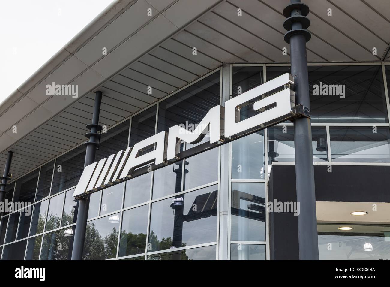 AMG Logo Sign on Mercedes Benz Dealership Facade. Portsmouth, UK, 3 July 2024 Stock Photo
