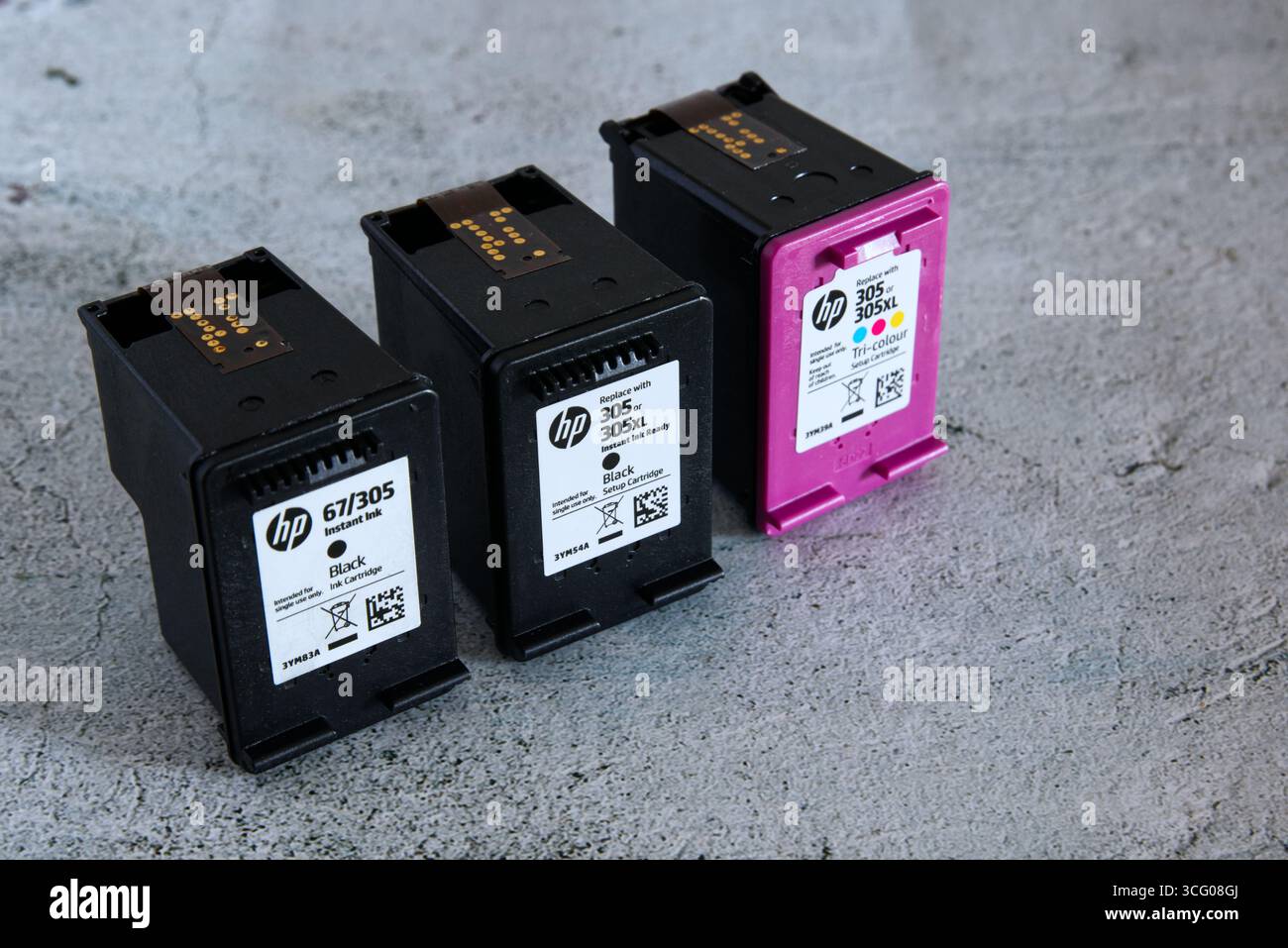 Empty HP printer cartridges on a light background Stock Photo