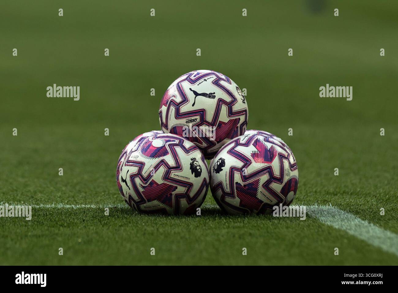 A stack of the new PUMA Orbita Ultimate PL balls during the Premier League match Newcastle United vs Liverpool at St. James's Park, Newcastle, United Kingdom, 25th August 2025  (Photo by Mark Cosgrove/News Images) Stock Photo