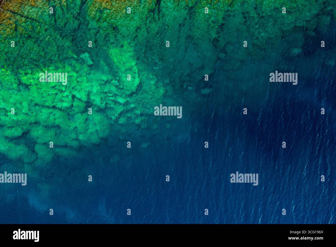 Drone aerial of rocky sea coast with transparent turquoise water. Seascape top view, Kefalonia, Cephalonia Greek island ionean sea Stock Photo