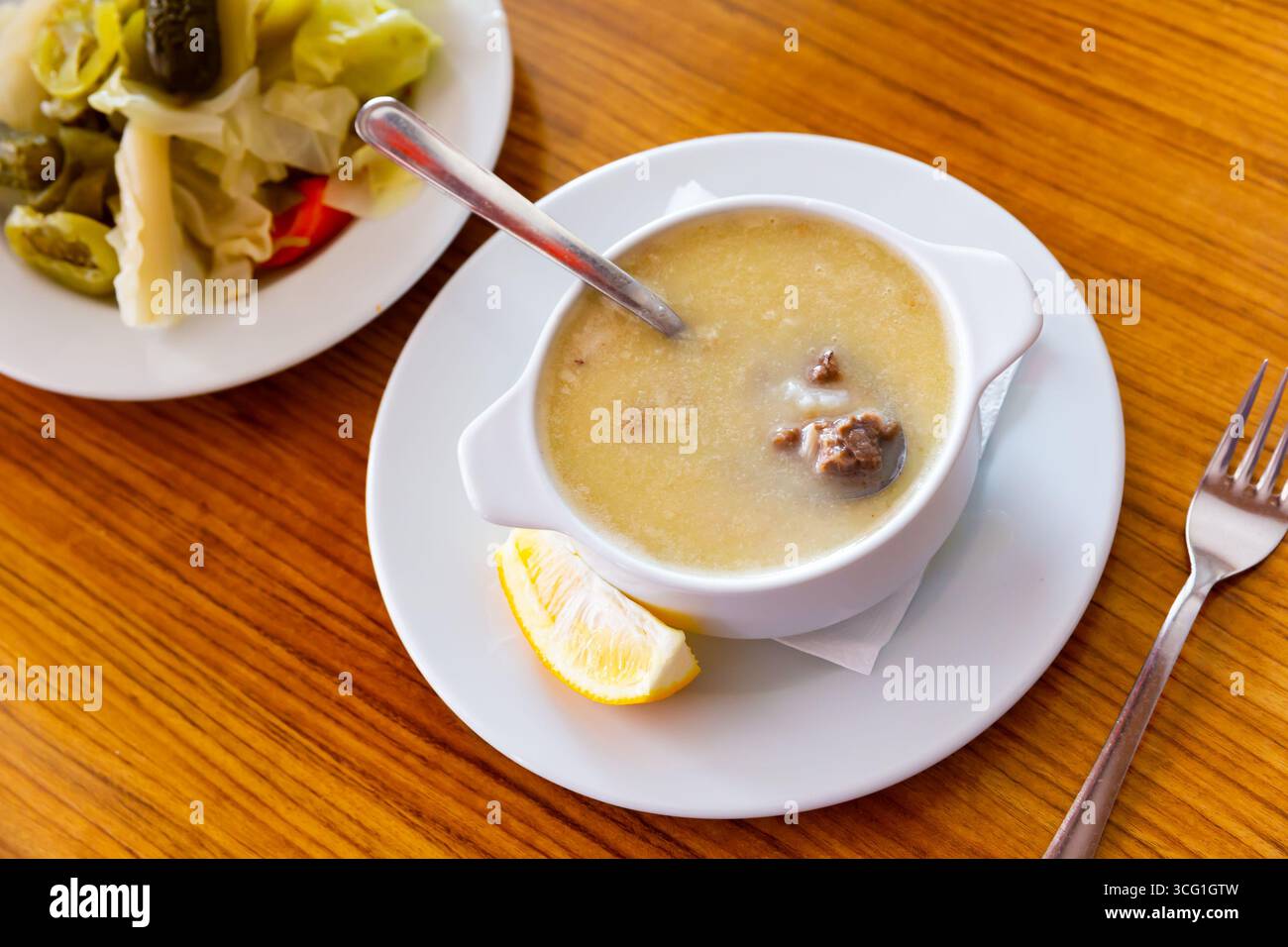 Turkish Paca Turkish soup Paca corbasi served with pickle vegetables Stock Photo - Alamy