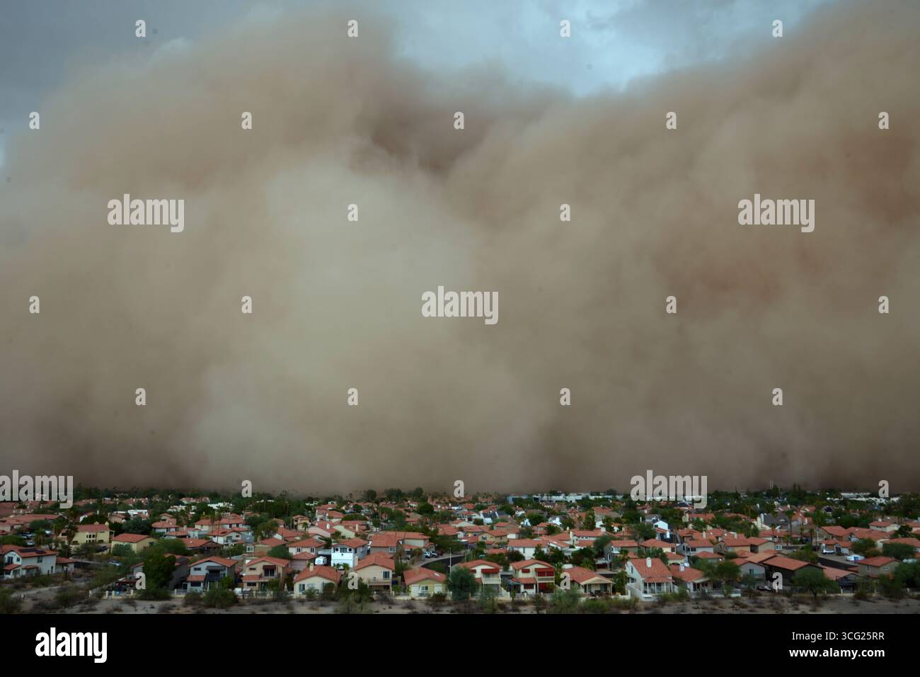 A giant dust storm approaches the Phoenix metro area as a monsoon storm ...