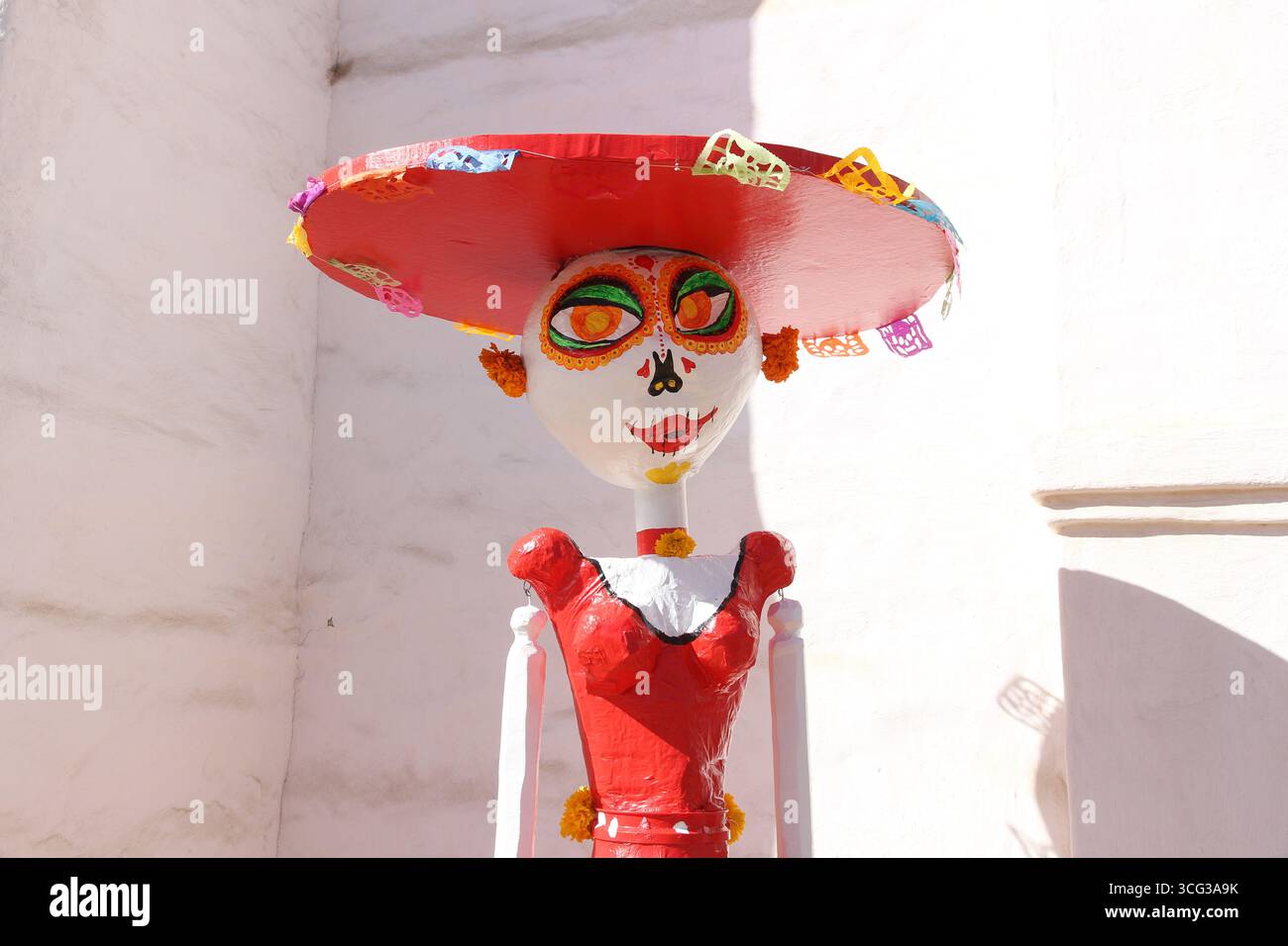 A sugar skull doll during Dia de los Muertos Craft Day in Presidio de Santa Barbara. Stock Photo