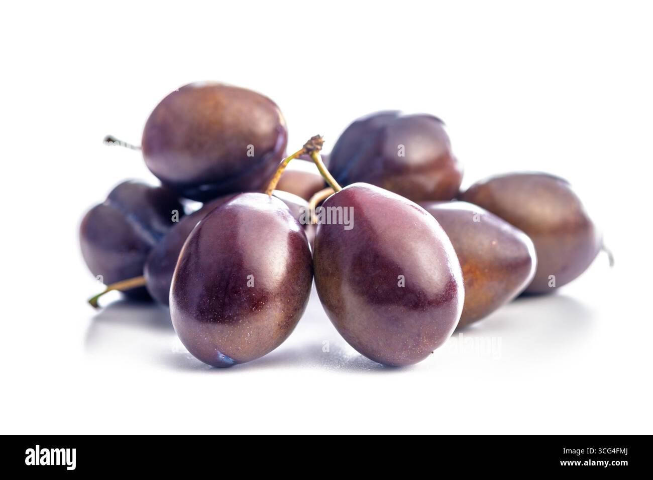 Ripe plums isolated on a white background. Stock Photo