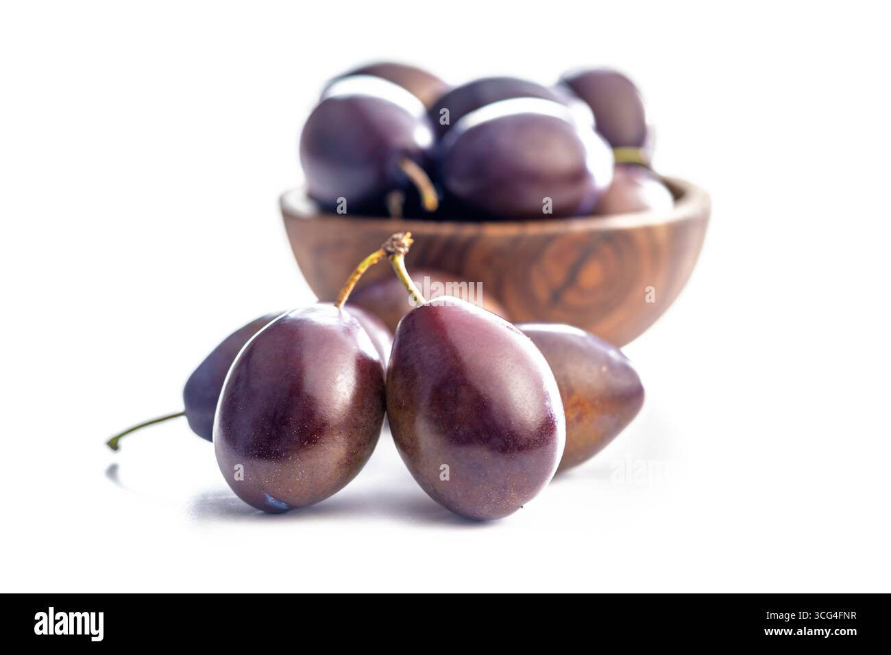Ripe plums isolated on a white background. Stock Photo