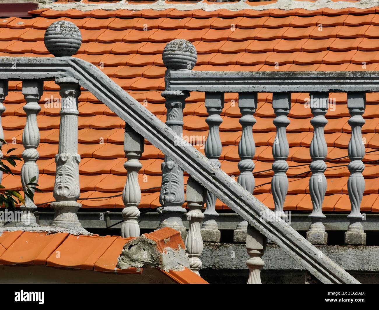 Pillars, Fence and Rooftop Stock Photo