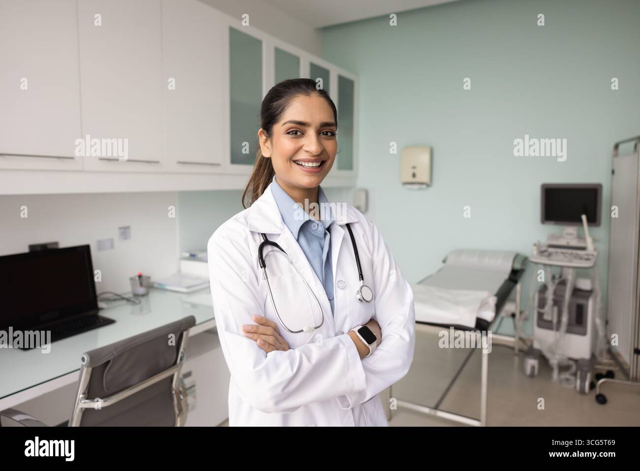 Positive young Indian medical specialist woman posing for portrait Stock Photo