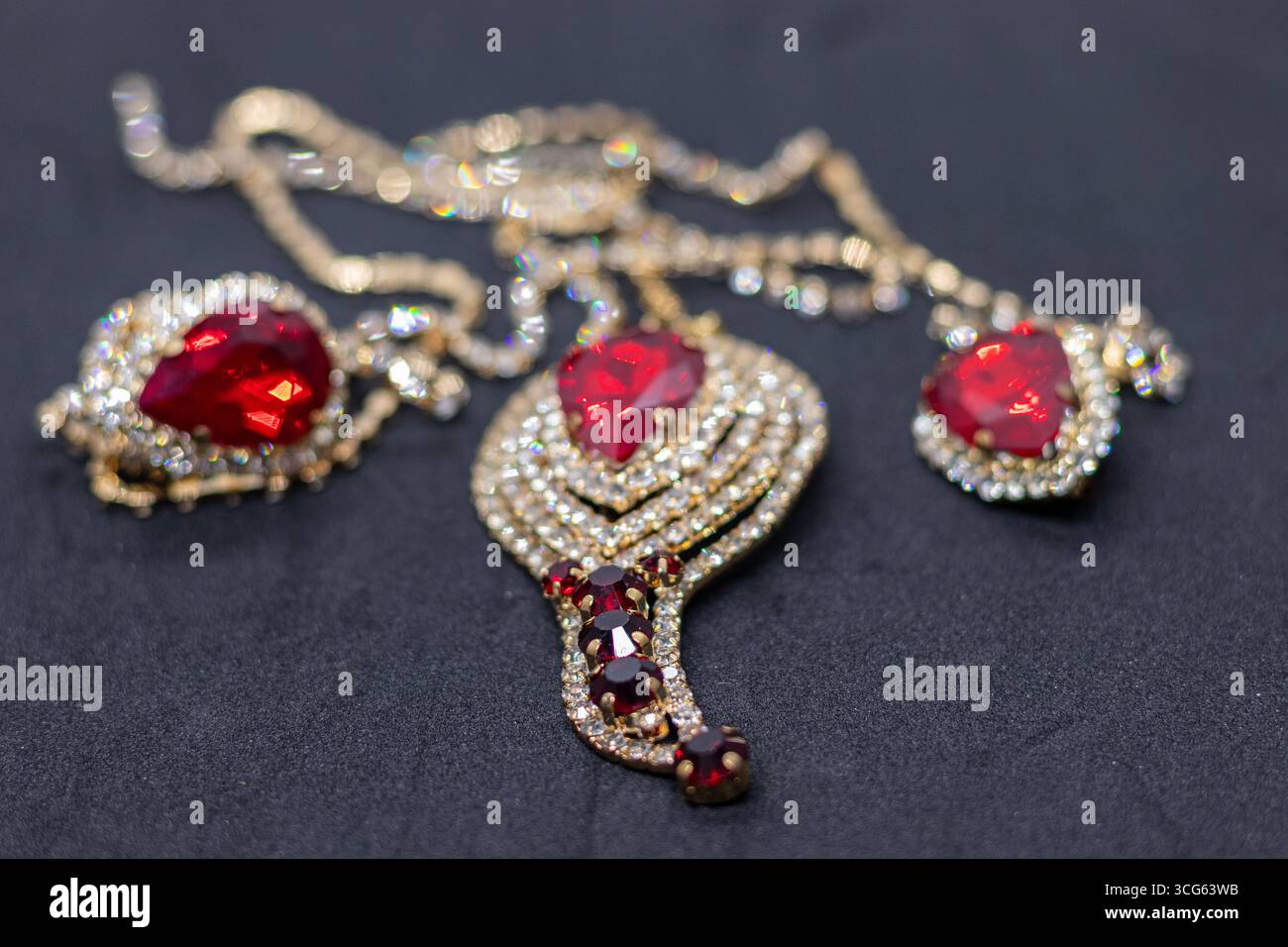 Bridal Red Crystal Jewelry Set with Necklace and Earrings for Special Occasions. Stock Photo