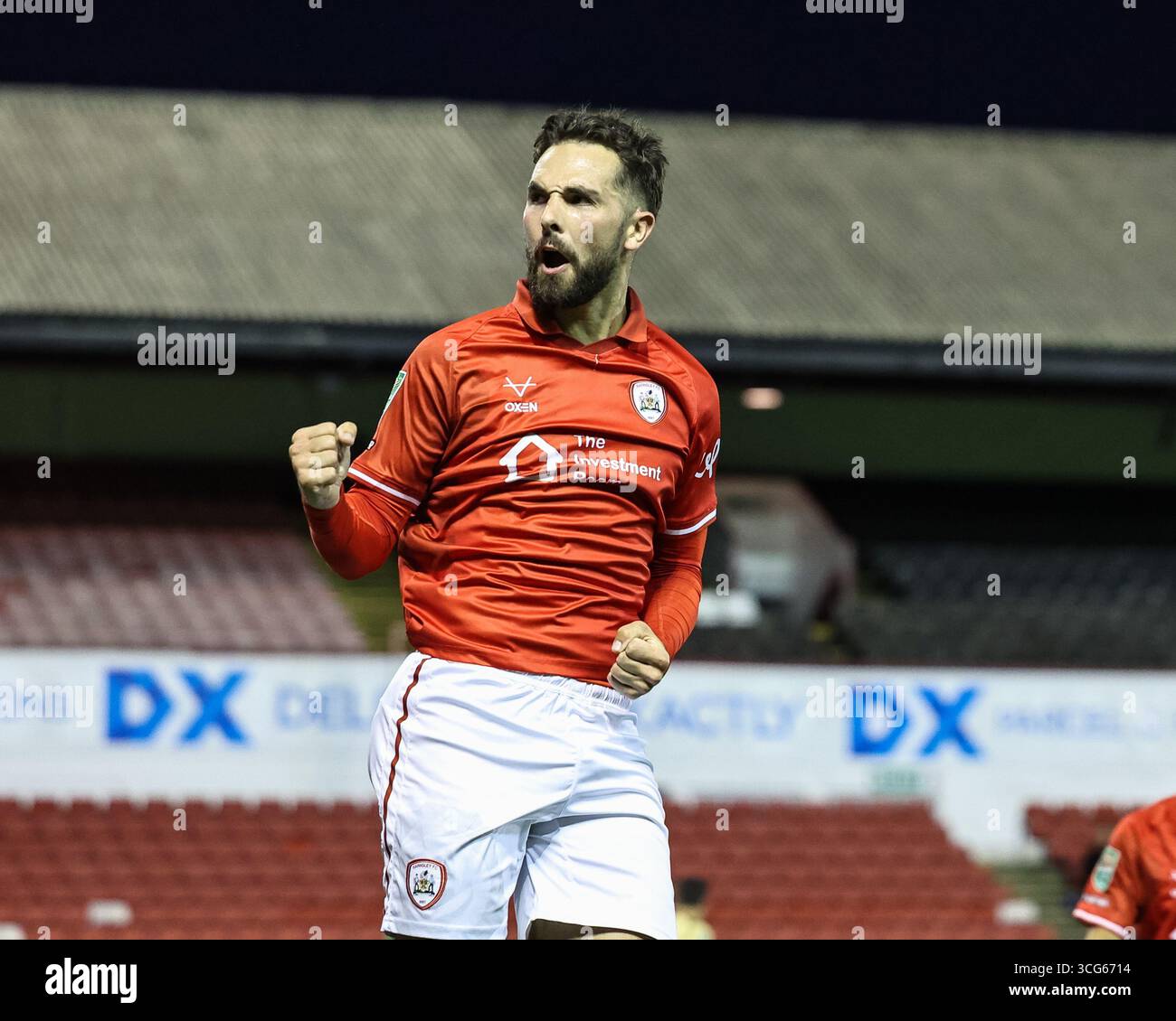 Adam Phillips of Barnsley celebrates his goal to make it 2-1 during the ...