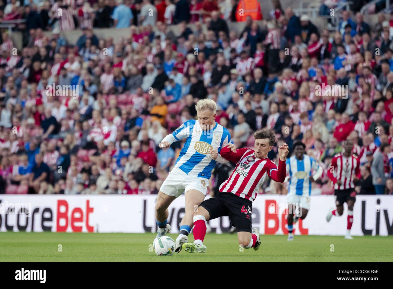 sunderland-england-aug-26-dan-neil-of-sunderland-r-and-joe-taylor