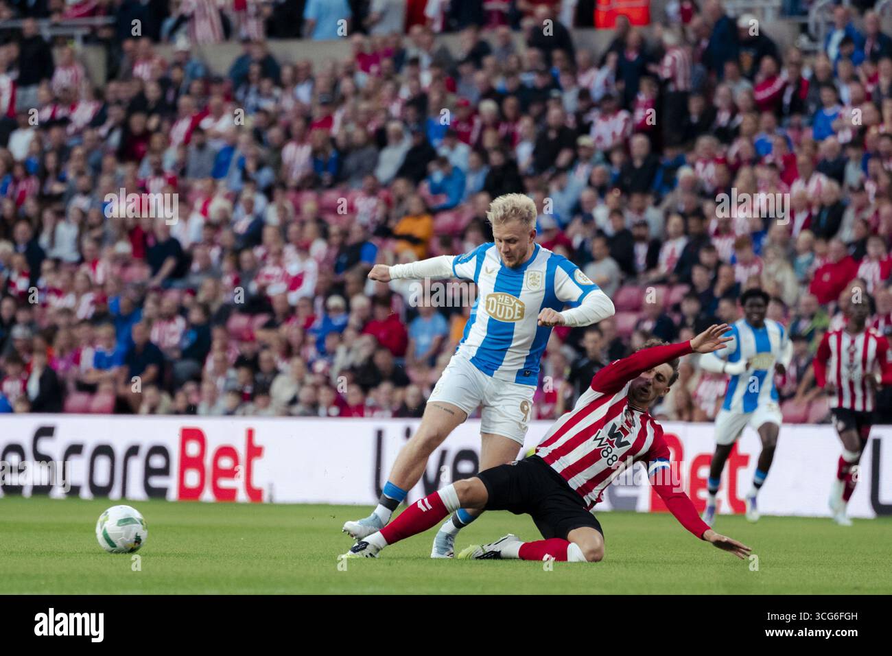 sunderland-england-aug-26-dan-neil-of-sunderland-r-and-joe-taylor