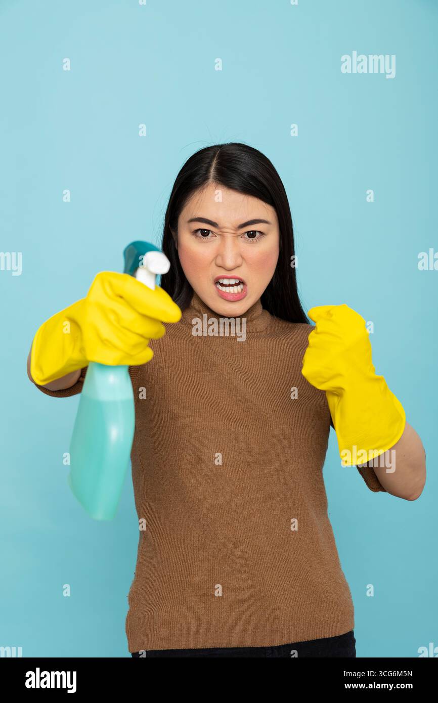 Asian lady cleaning her house hi-res stock photography and images - Alamy