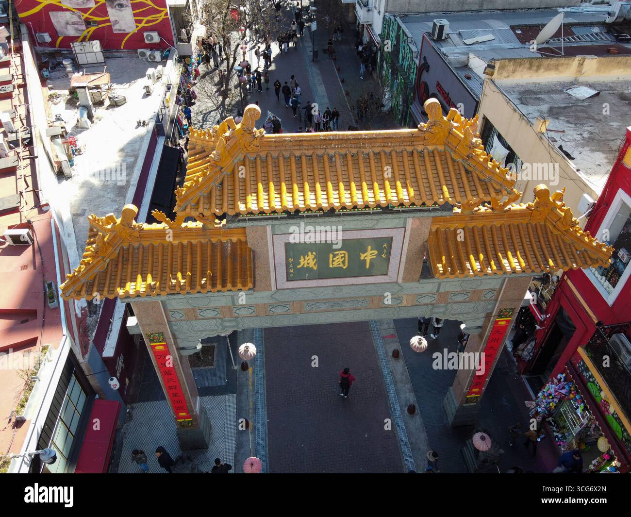 Panoramic view captures the dynamic street of Belgrano Chinatown, Buenos Aires, Argentina, featuring storefronts and pedestrian flow, suggesting varie Stock Photo