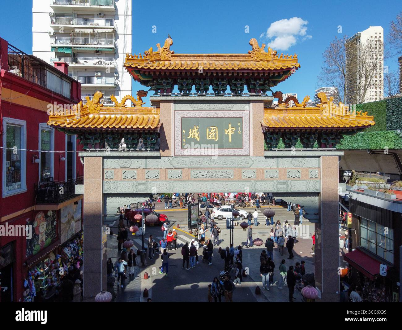 Aerial panoramic view of the access to Belgrano Chinatown, Buenos Aires, Argentina, highlighting its distinctive arch and the urban environment with t Stock Photo