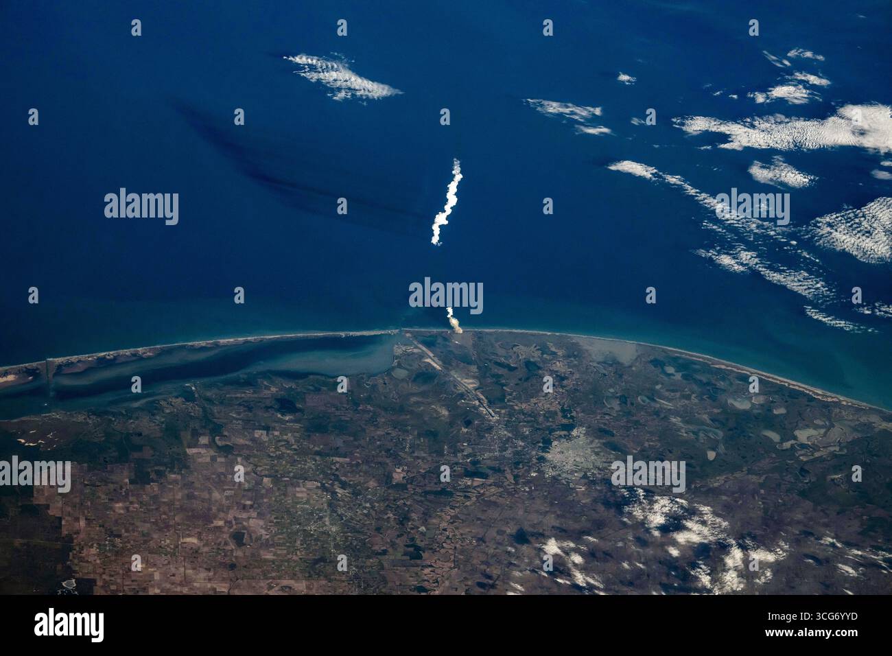 The launch of the SpaceX Starship 6 rocket seen from the space station/ The plume from the SpaceX Starship 6 rocket can be seen after launching on its sixth flight test from the company's Starbase site in Boca Chica, Texas.   An optimised version of an original NASA image:  Credit: NASA/DPettit Stock Photo
