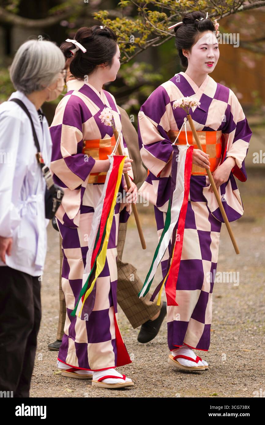 Women dressed in traditional Japanese Kimono with ornate hair styling ...