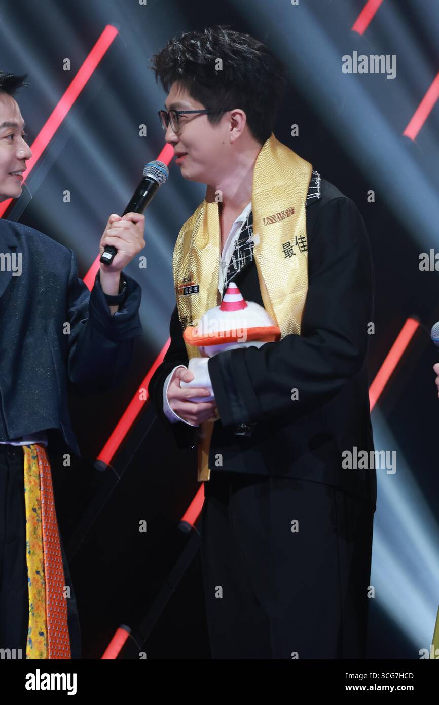 Chinese singer and songwriter Mao Buyi attends an activity in Shanghai ...