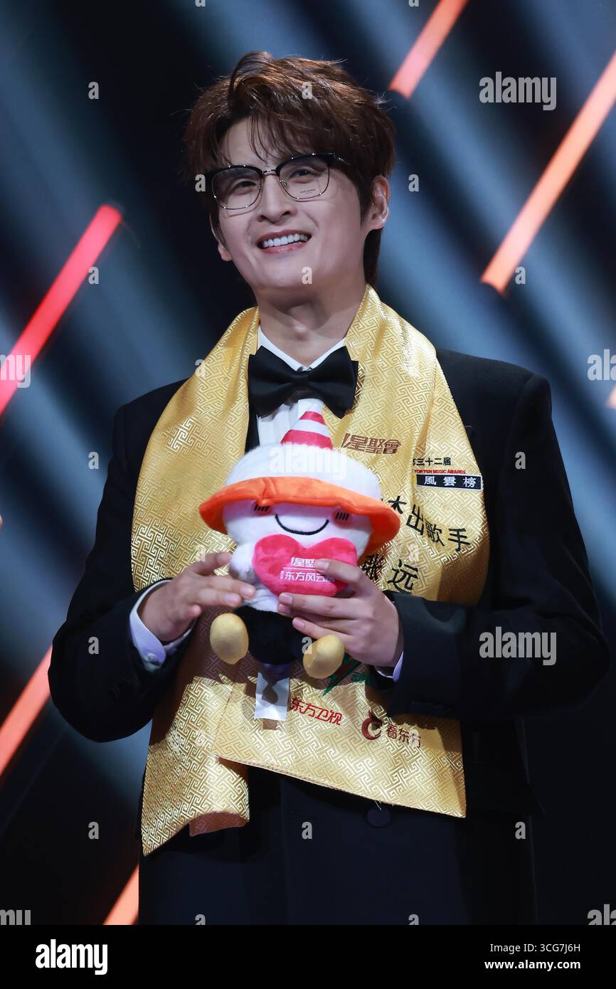 Chinese singer Zhang Yuan attends an activity in Shanghai, China, 25 ...