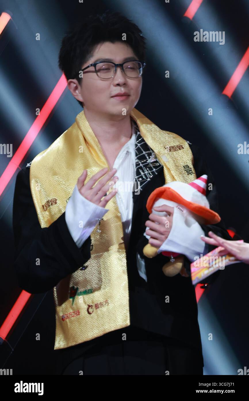 Chinese singer and songwriter Mao Buyi attends an activity in Shanghai ...