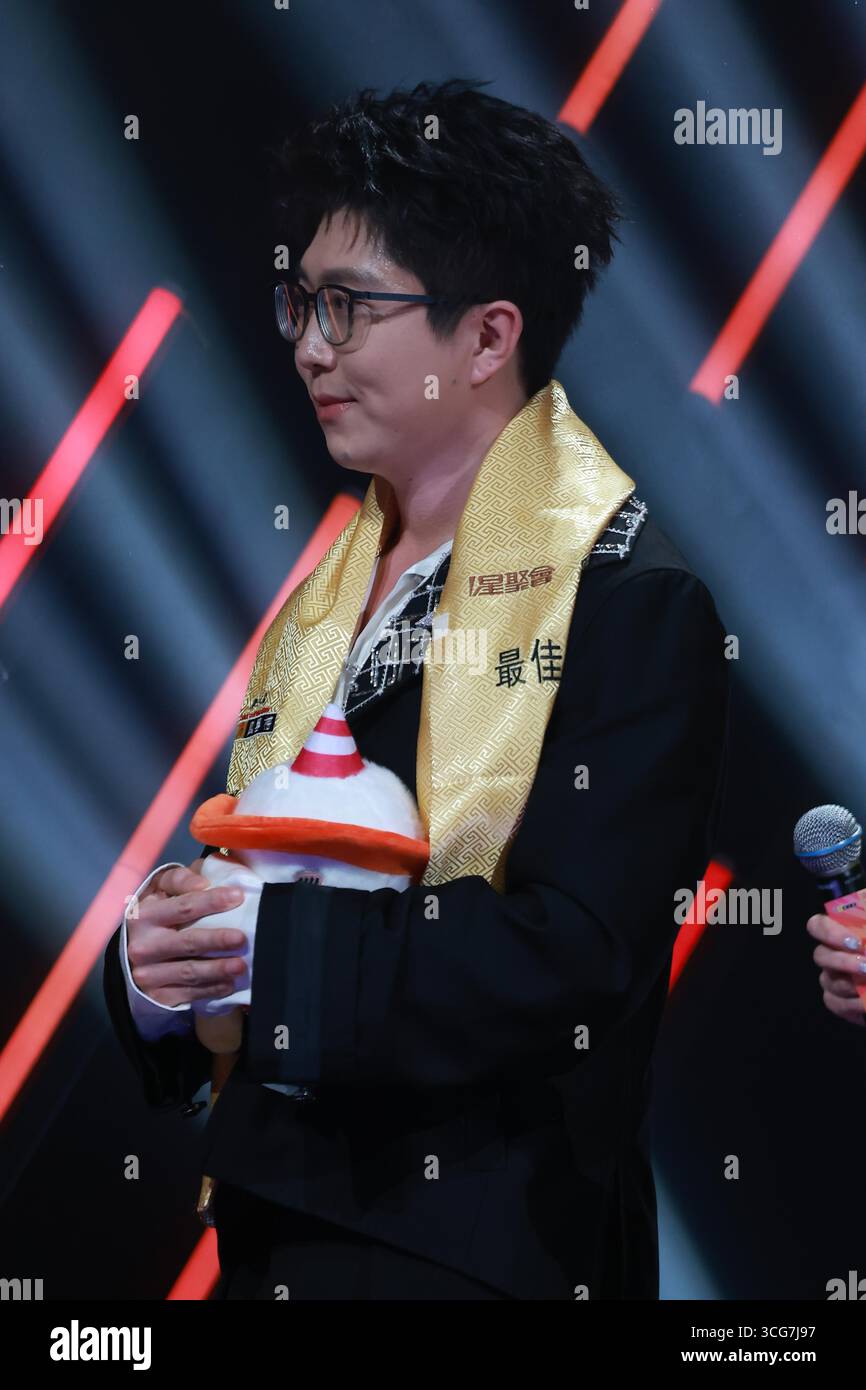 Chinese singer and songwriter Mao Buyi attends an activity in Shanghai ...