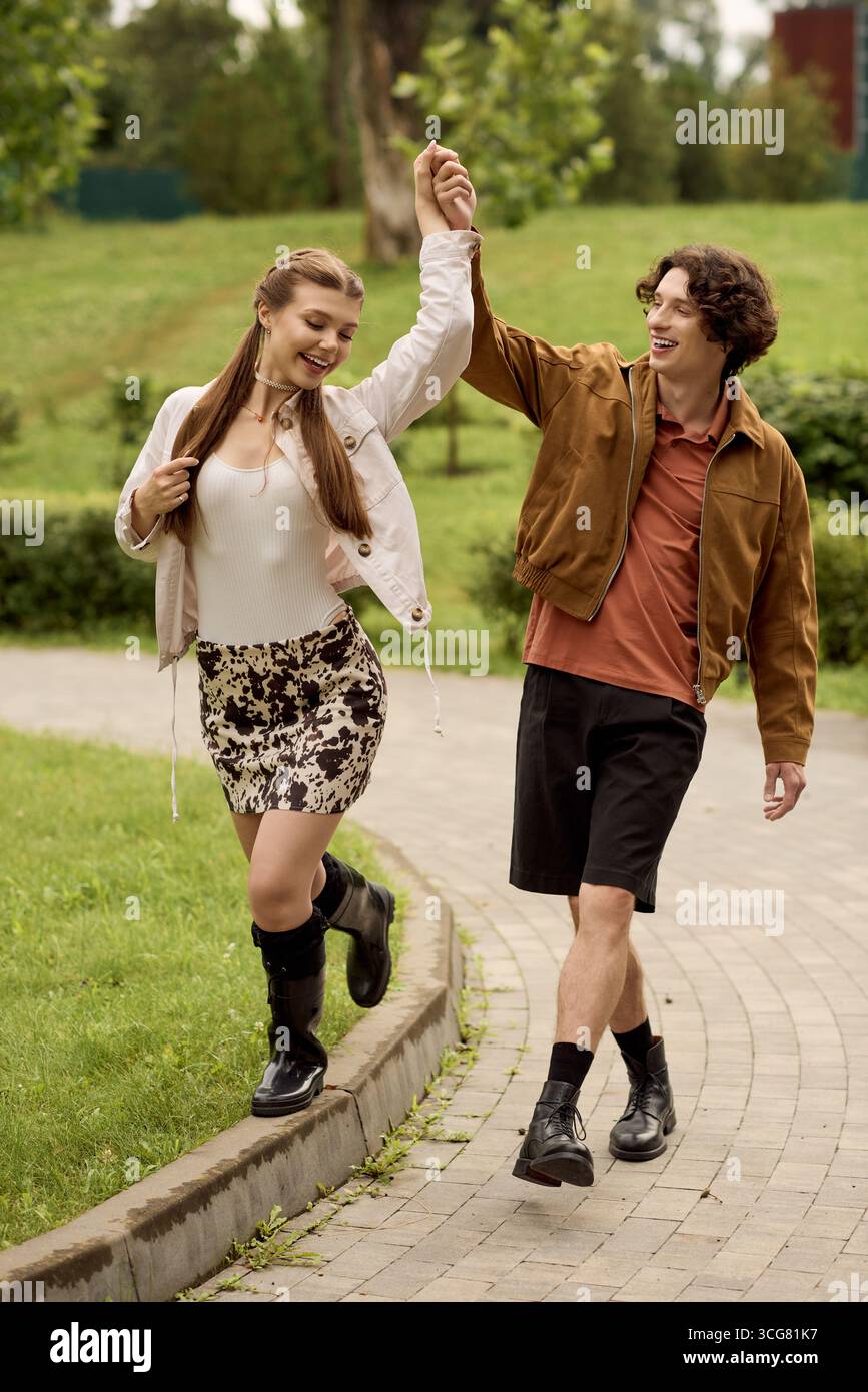 Loving couple strolls hand in hand along a winding path, sharing smiles ...